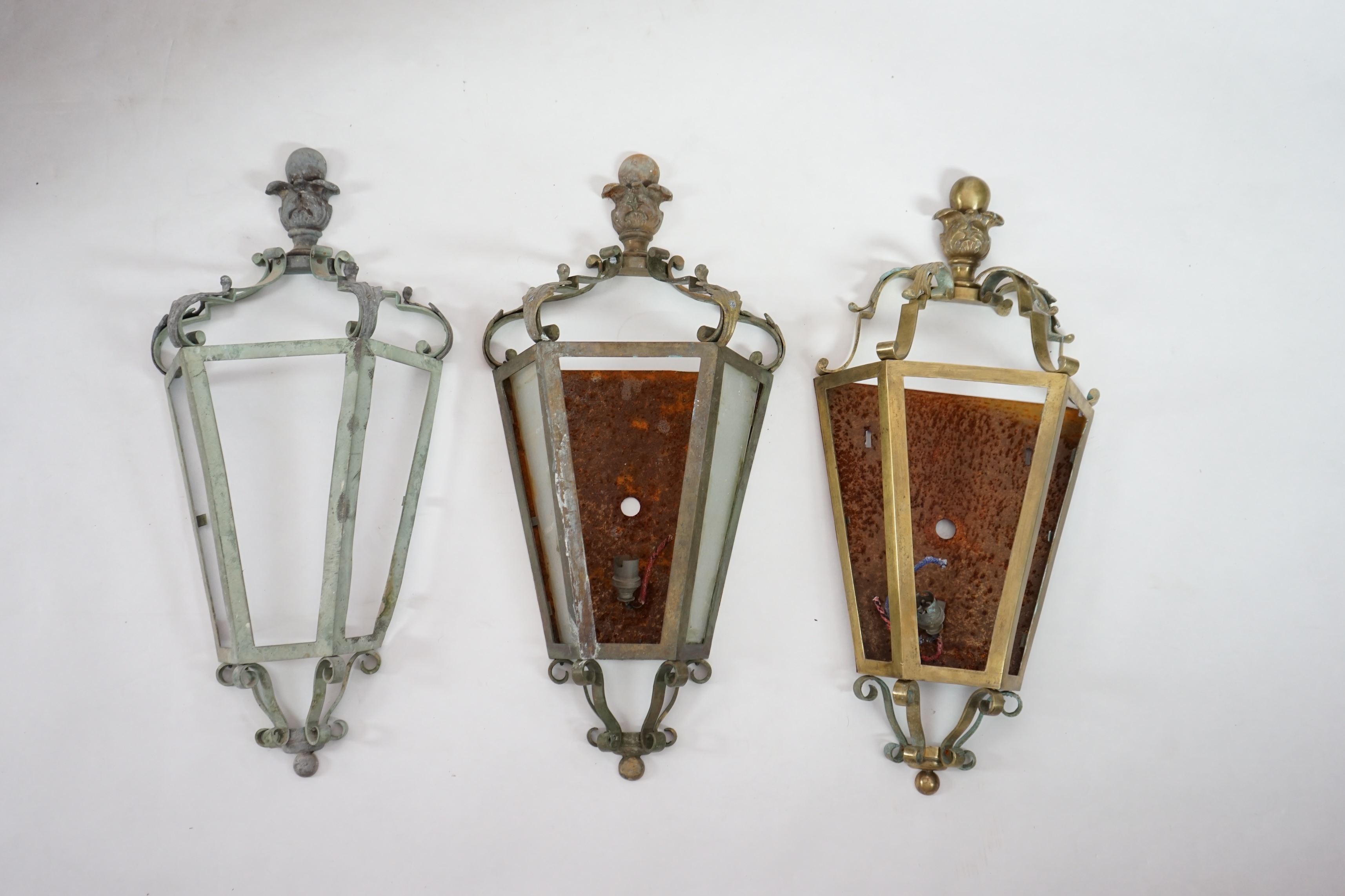 A set of three antique French brass wall lights